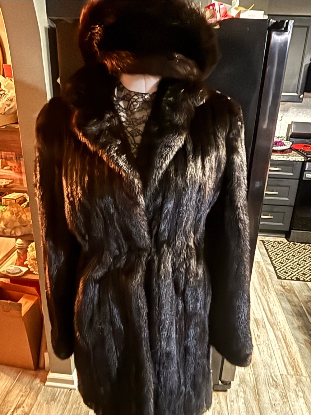 Luxurious Black Fur Coat with Plush Collar with brown fur hat.